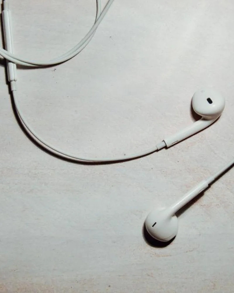 Illustrative photo of earbuds, not the exact EarFun Air Pro 4
