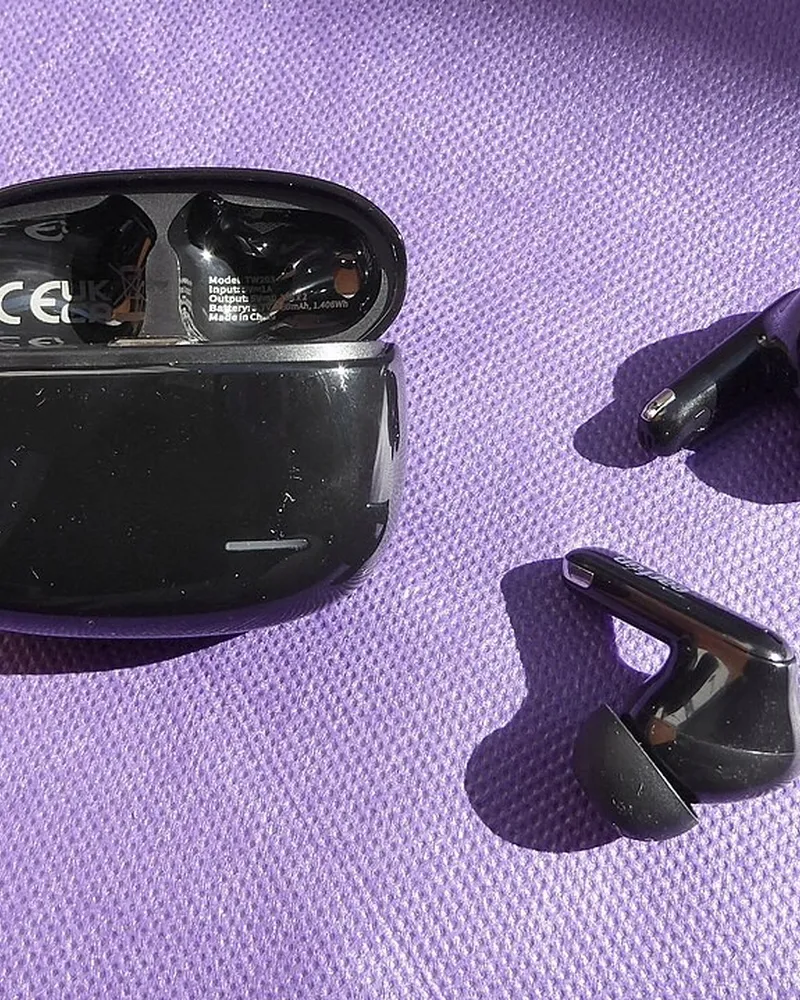 Illustrative photo of earbuds, not the exact Soundpeats Air5 Pro