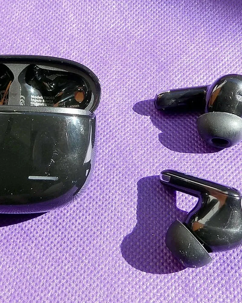 Illustrative photo of earbuds, not the exact JBL Vibe Beam 2