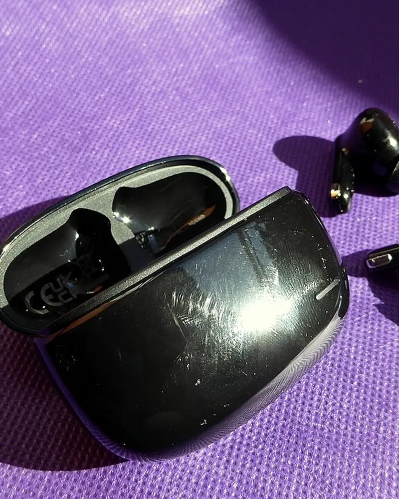 Illustrative photo of earbuds, not the exact EarFun Air Pro 4+