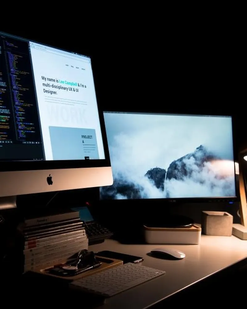 Illustrative photo of monitor arm / setup, not the exact VIVO Dual Monitor Desk Mount
