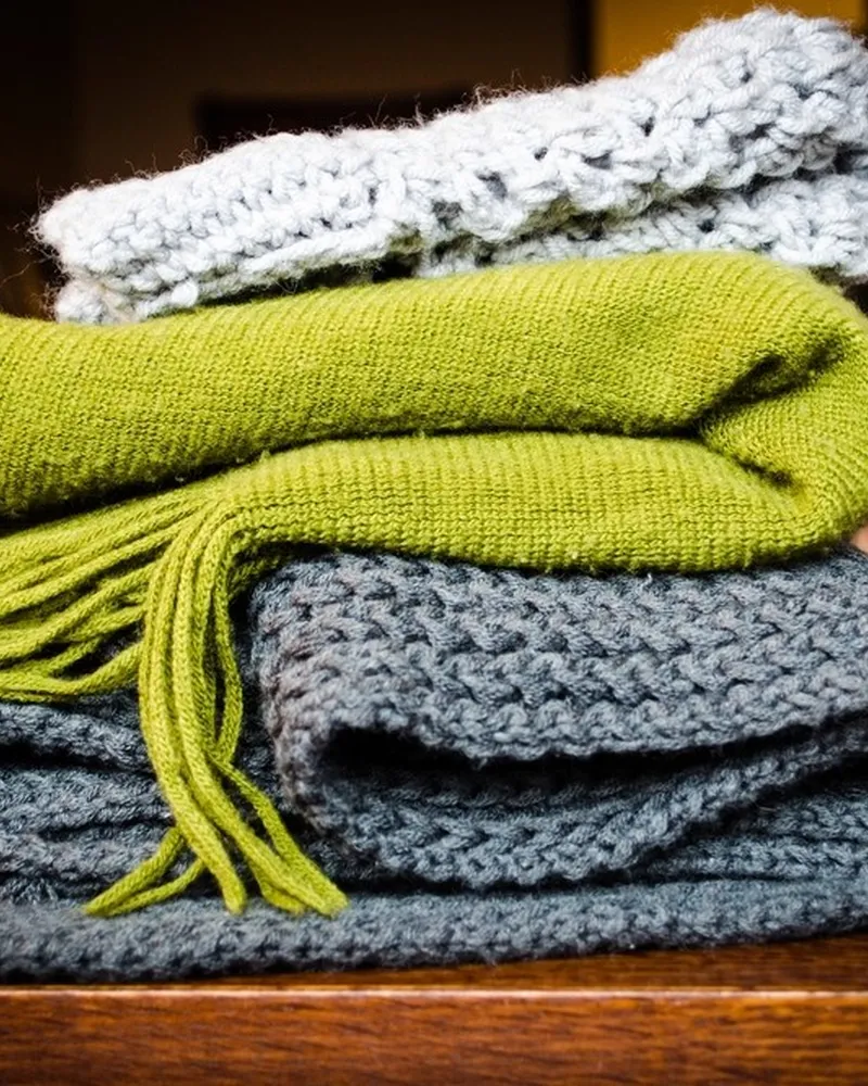 Illustrative photo of throw blanket, not the exact Lands' End Cable Knit Throw
