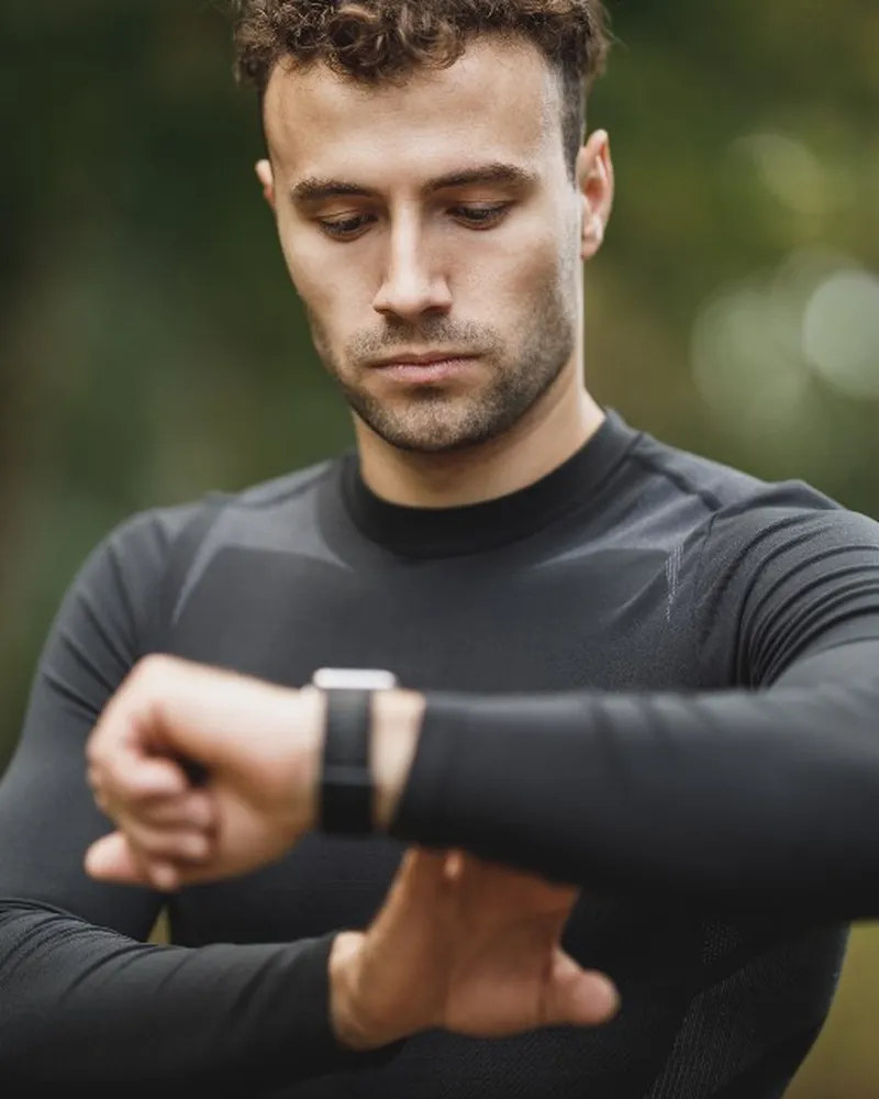Illustrative photo of smartwatch, not the exact Garmin Forerunner 165