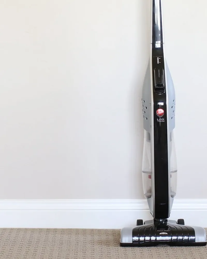 Illustrative photo of a stick vacuum, not the exact Tineco Pure One A50S