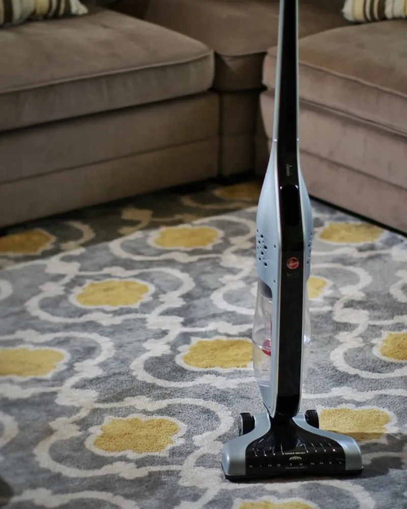 Illustrative photo of a stick vacuum, not the exact Shark Stratos Cordless