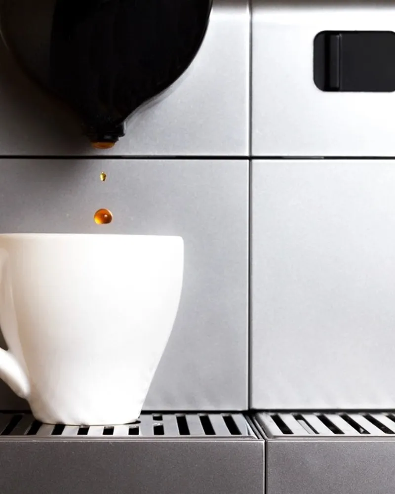 Illustrative photo of a espresso machine, not the exact Breville Barista Express Impress