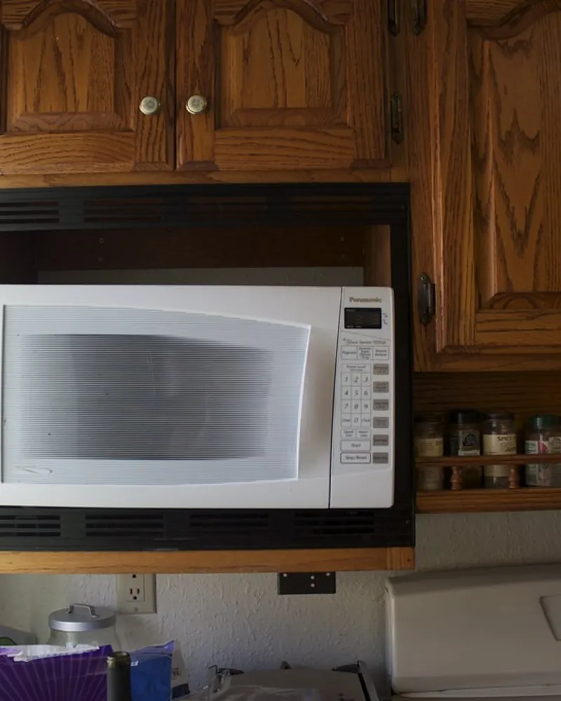 Illustrative photo of a microwave, not the exact Toshiba ML-EM34P(SS) Smart Sensor