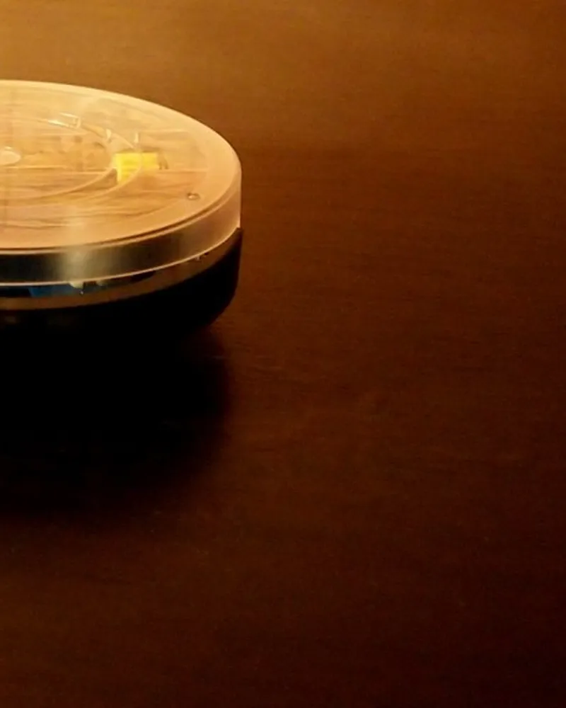 Illustrative photo of a robot vacuum, not the exact eufy Omni E25