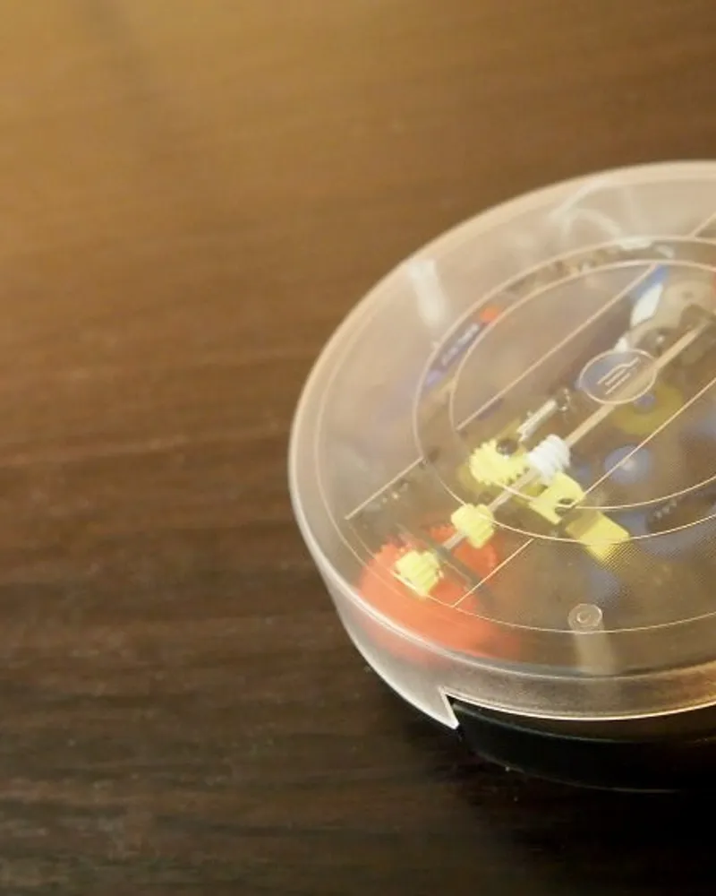 Illustrative photo of a robot vacuum, not the exact Roborock Qrevo 2 Pro