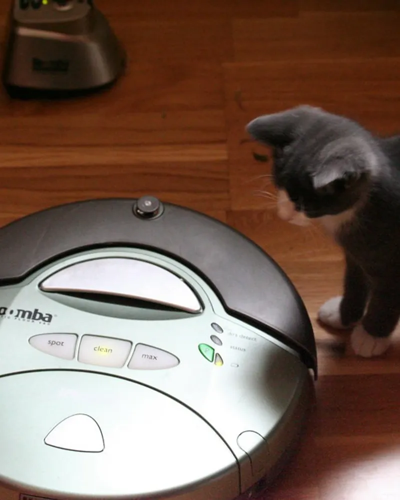 Illustrative photo of a robot vacuum, not the exact Ecovacs Deebot X8 Pro Omni